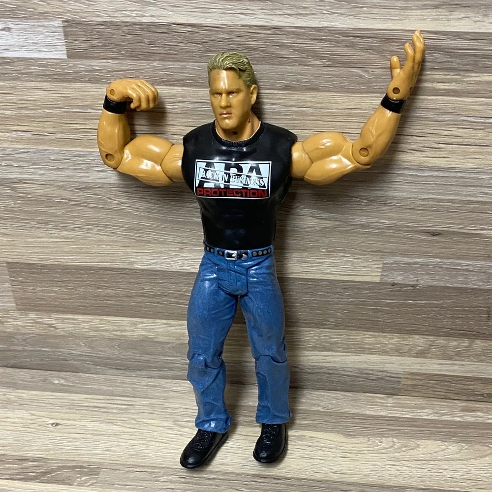 WWE Wrestling Action Figures with Black Shirts and Blue Jeans